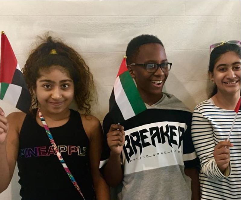 Read more about the article iCademy ME students raising the flag in unity for UAE National Flag Day